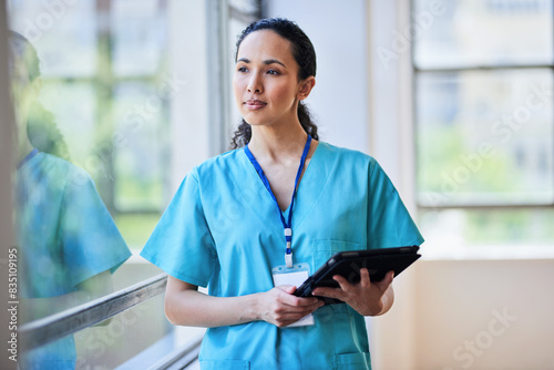 Canvastavla Professional Female Nurse in Scrubs with Digital Tablet at Hospital