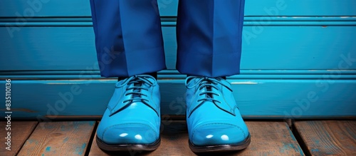 Blue shoes and trousers sym...