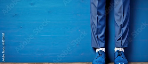 Blue shoes and trousers sym...