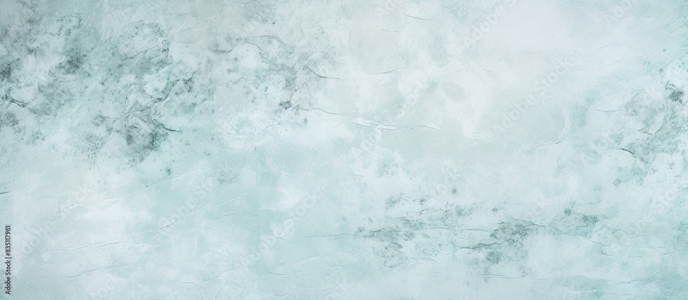 Light blue and white stone texture background for summer wallpaper with vintage tones, abstract wall in a mint green cement texture, featuring a copy space image. Light blue and white stone texture background for summer wallpaper with vintage tones, abstract wall in a mint green cement texture, featuring a copy space image.