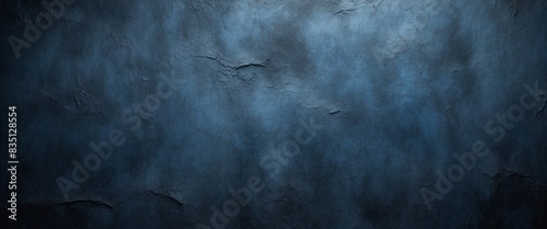 Background image of texture plaster on the wall in dark blue black tones in grunge style. photo