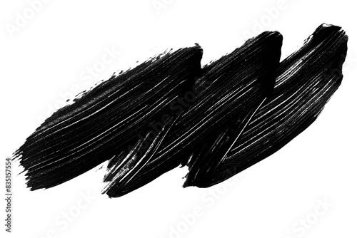 a stroke of black paint on a blank background