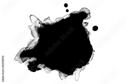 black paint or ink stain spilled in the form of a spot or splash on a blank background
