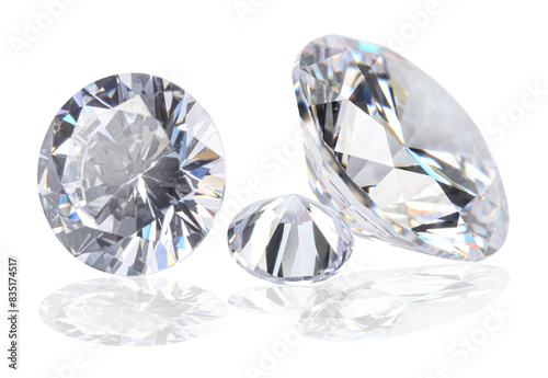 Three beautiful dazzling diamonds on white background