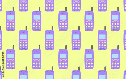 Seamless pattern with a push-button mobile phone from the 90s.
