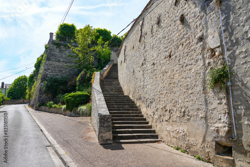 Stairway leading to the Place du Larry in Château-Landon, a rural village of the Gâtinais in the French department of Seine-et-Marne, France photo