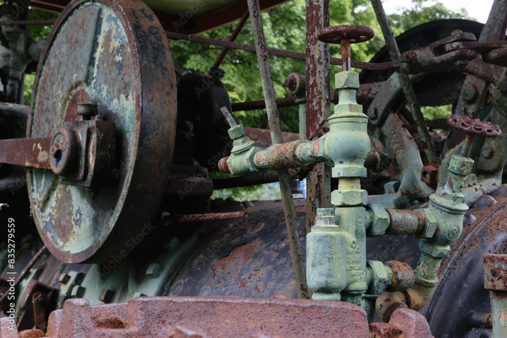 Rusty Industrial Machine with Pipes and Valves Rusty Industrial Machine with Pipes and Valves