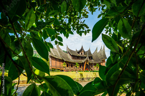 Rumah Gadang adalah nama untuk rumah adat Minangkabau yang merupakan rumah tradisional dan banyak jumpai di Sumatera Barat, Indonesia. photo