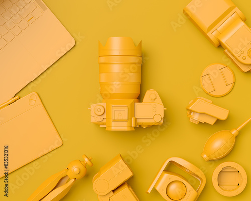 Top view of designer workspace and photography gear on monochrome table photo