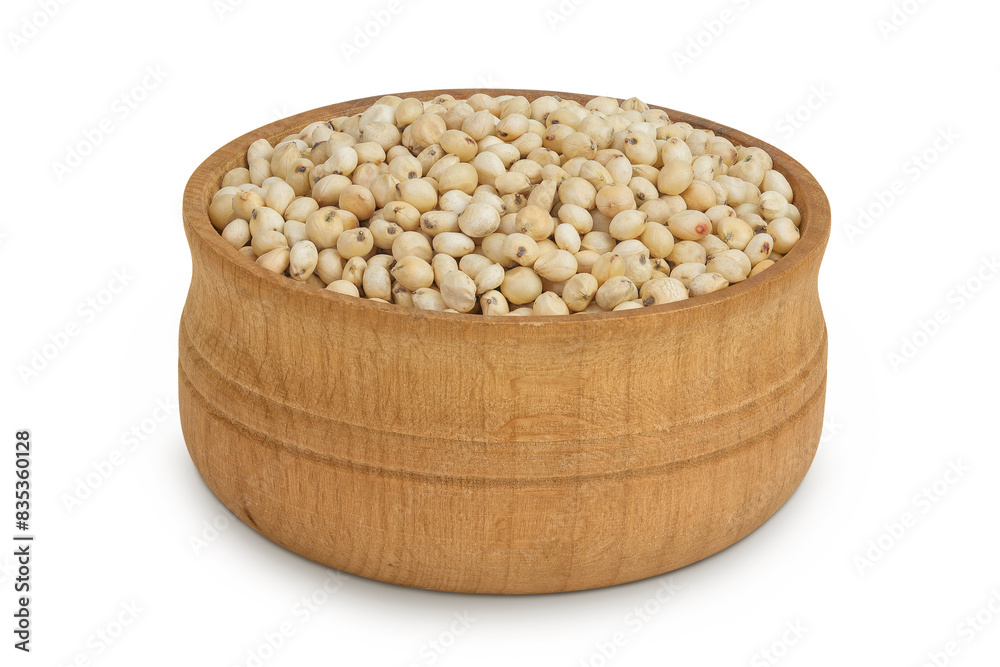 Sorghum seeds in wooden bowl isolated on white background with full depth of field. Sorghum seeds in wooden bowl isolated on white background with full depth of field.
