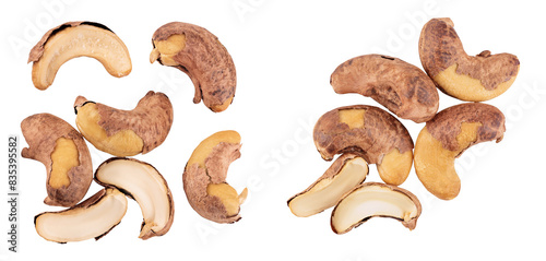 cashew nuts heap with shell isolated on white background. Top view with copy space for your text. Flat lay