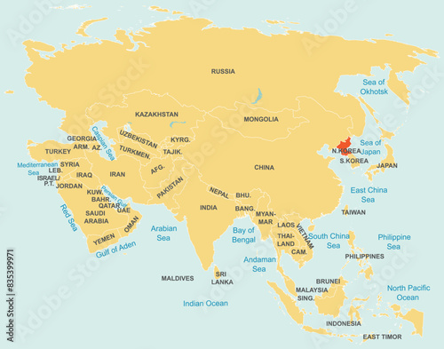 Highlighted red map of NORTH KOREA inside orange detailed tagged map of Asia using orthographic projection on blue background