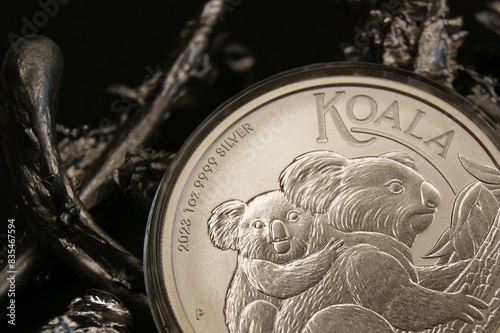 Fragment of an Australian pure silver investment coin 1 dollar Koala 2023 close-up.