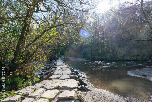 Photo of the clapper bridge at Tarr steps in Exmoor National Park photo