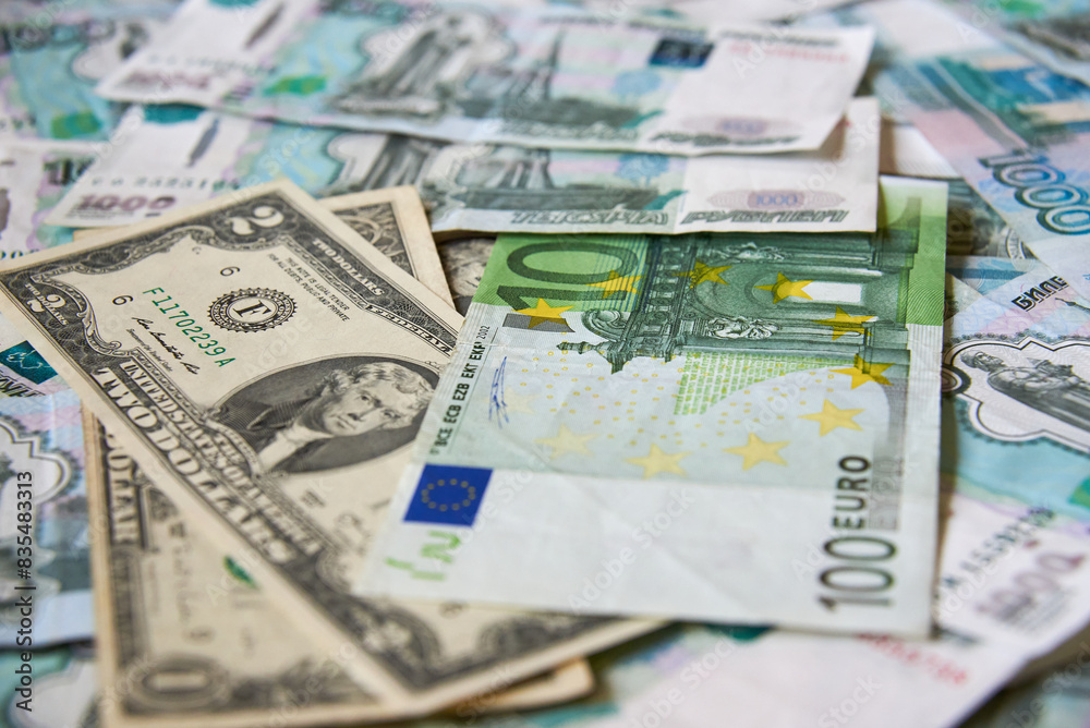 background of paper bills dollars, euros and rubles. Currency exchange rate background of paper bills dollars, euros and rubles. Currency exchange rate
