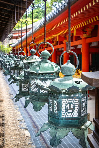 kasuga taisha shrine, nara, temple, bronze lanterns, park, japan, asia, red, vermilion, metal, lamps photo