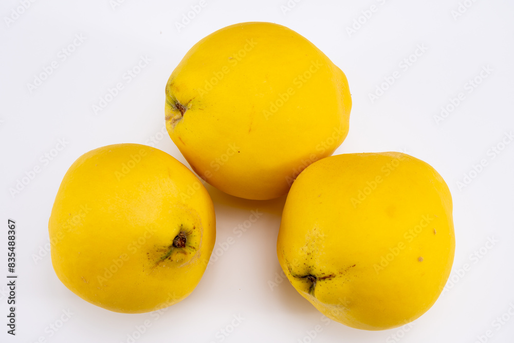 Group of ripe yellow quince apples close up Group of ripe yellow quince apples close up