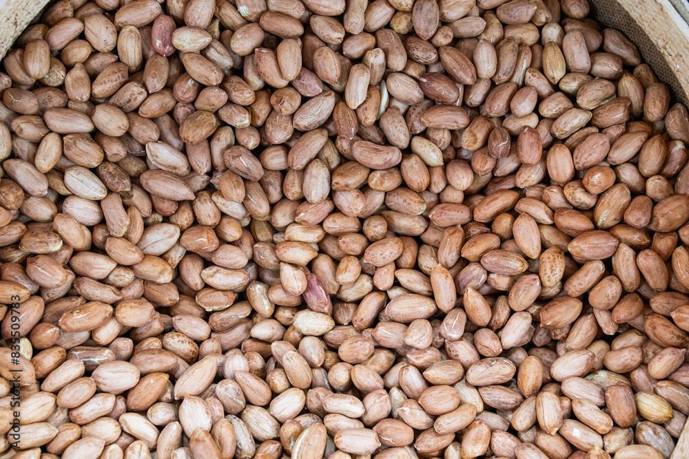 Raw peanuts sold in a snack shop. Raw peanuts sold in a snack shop.