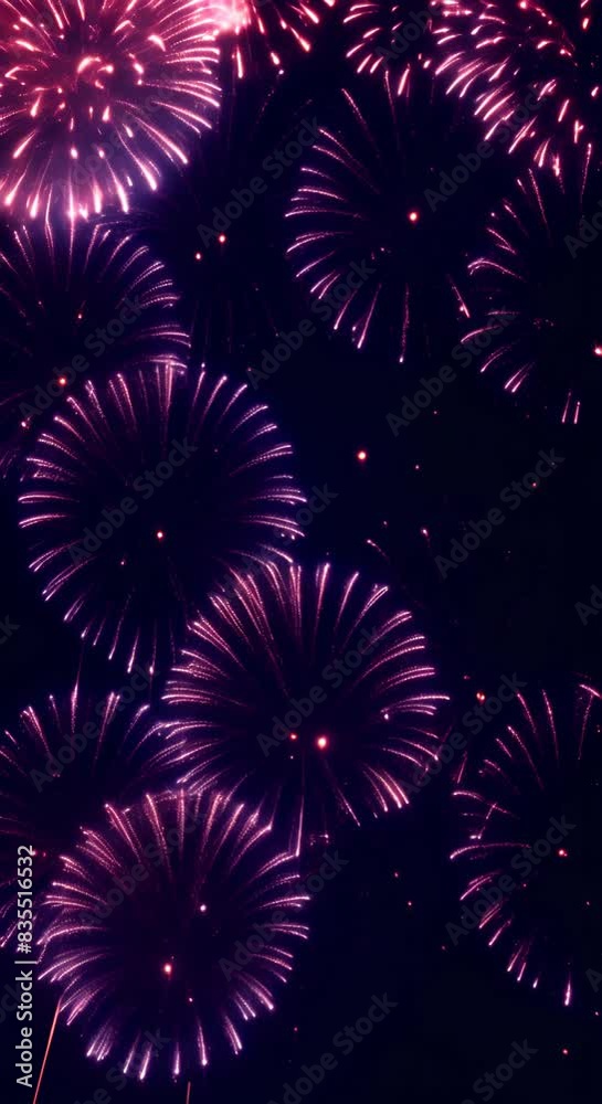 Vertical fireworks celebration loop seamless of real fireworks background abstract Multicolor golden shining glowing fireworks show with bokeh lights in the night sky Celebration holiday Vertical fireworks celebration loop seamless of real fireworks background abstract Multicolor golden shining glowing fireworks show with bokeh lights in the night sky Celebration holiday