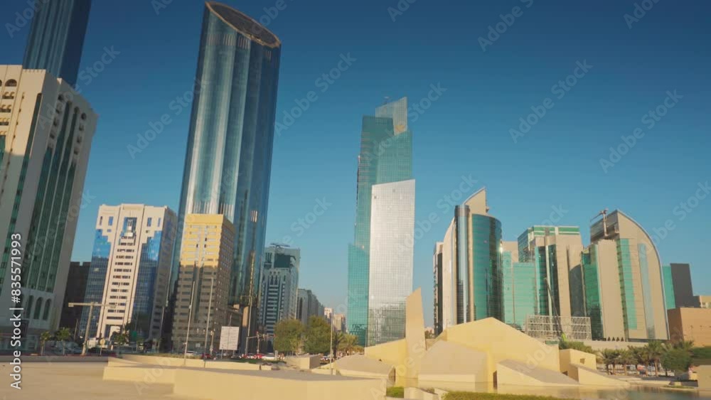 Abu Dhabi, United Arab Emirates - Jan 10 2024, 4k, Panoramic view of the square with the Al Musallah public space, built by the CEBRA, with skyscrapers in background, Abu Dhabi, United Arab Emirates Abu Dhabi, United Arab Emirates - Jan 10 2024, 4k, Panoramic view of the square with the Al Musallah public space, built by the CEBRA, with skyscrapers in background, Abu Dhabi, United Arab Emirates
