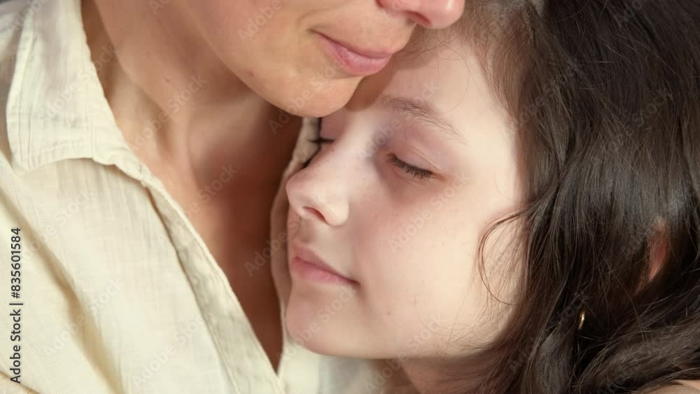 Tender relationship with mum inside. A little girl feel tender emotions to her mother. A concept of lovely emotions with family.