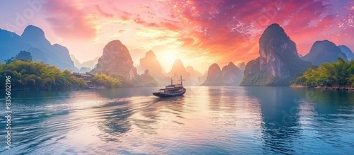 Landscape photography, Chinese mountains and rivers with green vegetation, boats on the river, blue sky and white clouds photo