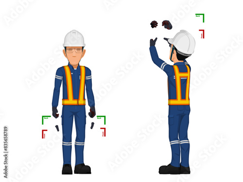 worker is holding something in his hand