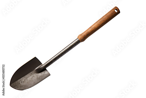 Close-up of a gardening hand trowel with a wooden handle and metal blade