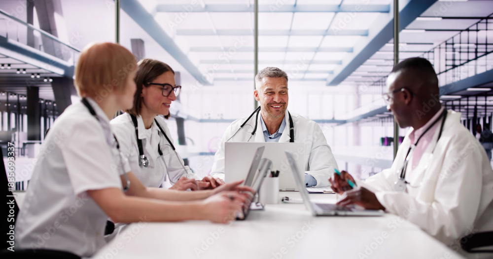 Medical Doctor Group Meeting At Desk Medical Doctor Group Meeting At Desk