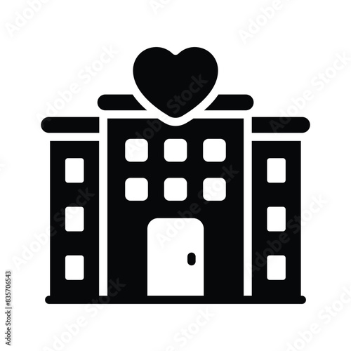 Hotel building with heart sign denoting concept icon of romantic hotel
