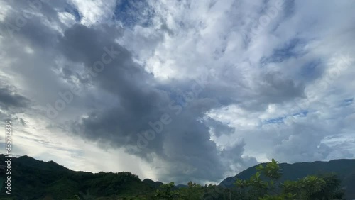 time lapse of clouds over the mountains