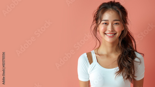 Korean cyclist woman smiles to celebrate workout achievement