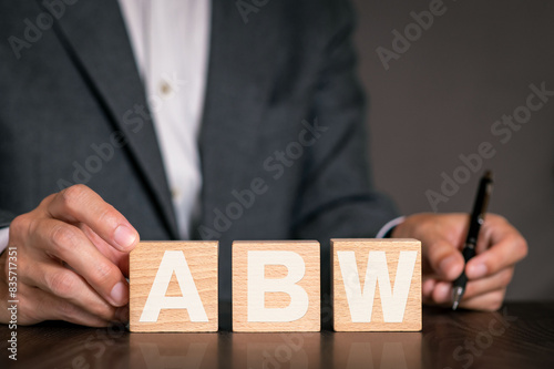 There is notebook with the word ABW. It is an abbreviation for Activity Based Working as eye-catching image.