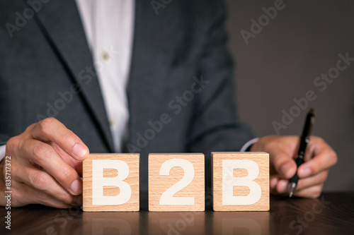 There is notebook with the word B2B. It is as an eye-catching image.