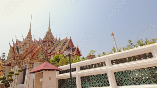 Bangkok, Thailand - 20th march, 2024: hyerlapse of walk around sightseeing The Grand Palace complex of buildings at the heart of Bangkok, capital Thailand photo