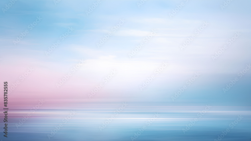 Obraz premium A serene and tranquil scene featuring a minimalistic abstract background in soft pastel shades of light pink and blue. The gentle curves and gradients create a calming and peaceful atmosphere.