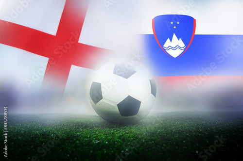 group C stage match , England vs Slovenia , Football Nation Flag and soccer ball on green grass