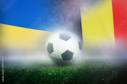 group E stage match , Ukraine vs Belgium , Football Nation Flag and soccer ball on green grass