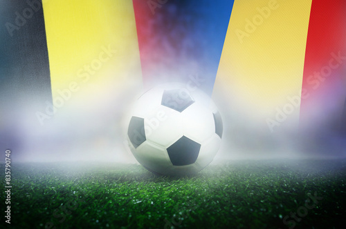group E stage match , Belgium  vs Romania , Football Nation Flag and soccer ball on green grass