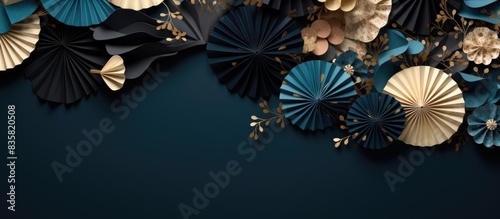 Textured paper fans on a festive backdrop for product display with available copy space image.