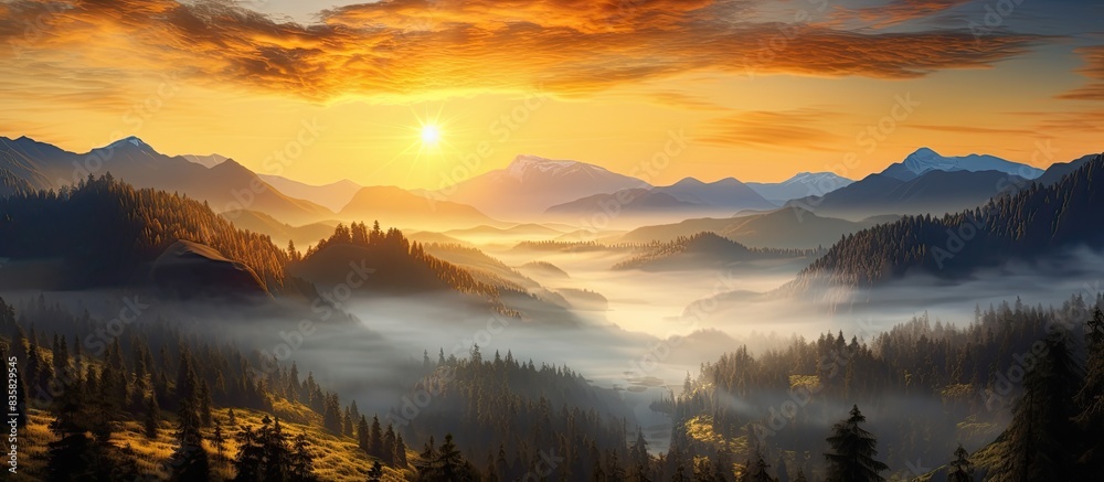 Fototapeta premium Autumn landscape featuring a stunning mist-covered valley with ample copy space image available.