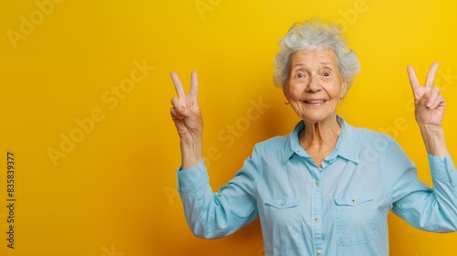 The Elderly Woman's Peace Gesture photo