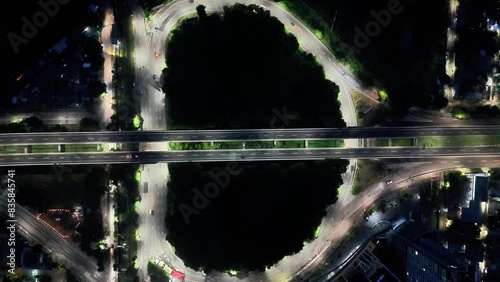 view of nighttime aerial traffic on Indonesian highways. road junctions and overpasses. Waru Roundabout Infrastructure, Surabaya, Indonesia. photo