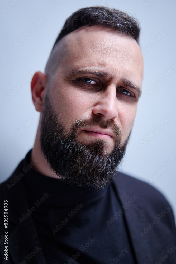 Fototapeta premium Studio portrait of young handsome man with beard.