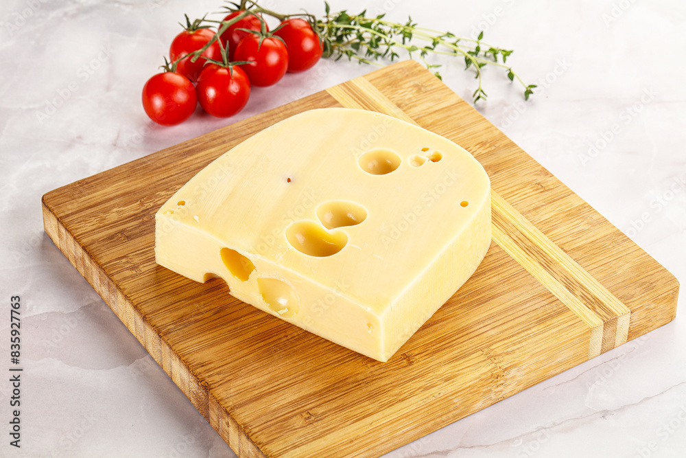 Maasdam cheese brick over board Maasdam cheese brick over board