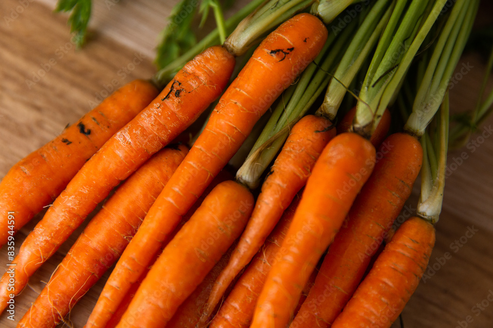 baby carrots with their tops on baby carrots with their tops on