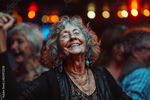 Senior Woman Dancing with Friends in a Club
