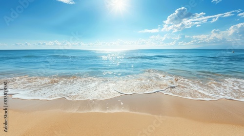 A sunny beach with clear blue water and a wide-open sky  leaving space for text