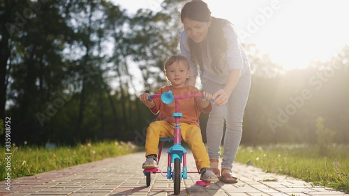 Bilde på lerret The boy kid riding his bike