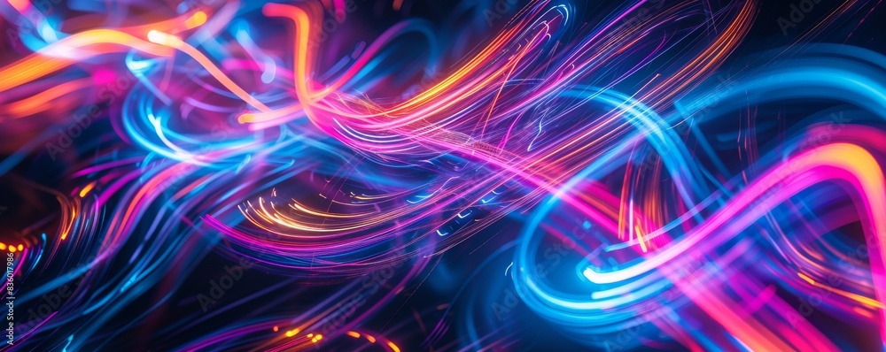 Vibrant abstract neon light trails on a dark background Vibrant abstract neon light trails on a dark background